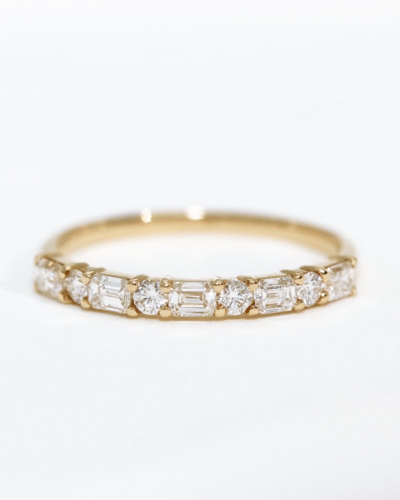 Round & emerald cut half eternity diamond ring