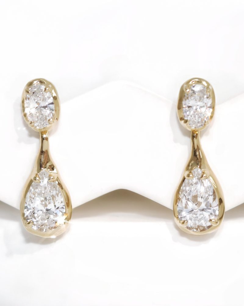 Oval & Pear Cut Diamond Stud Earrings